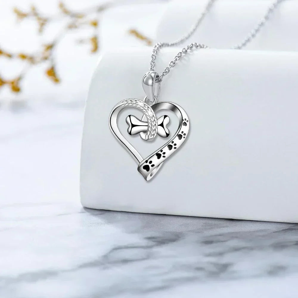 2 darabos ékszerszett, lábnyom, szív és csont medálokkal